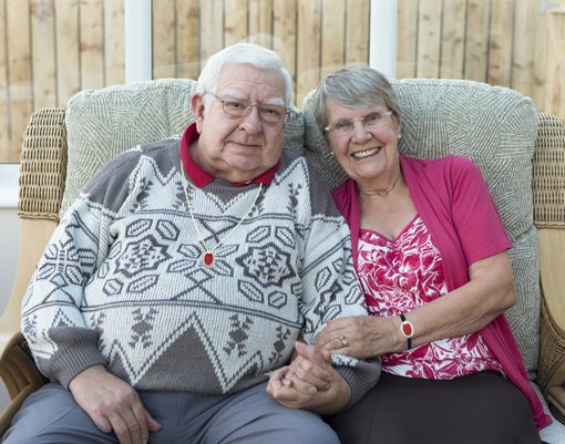 Elderly couple wearing their Carelink24 Pendants