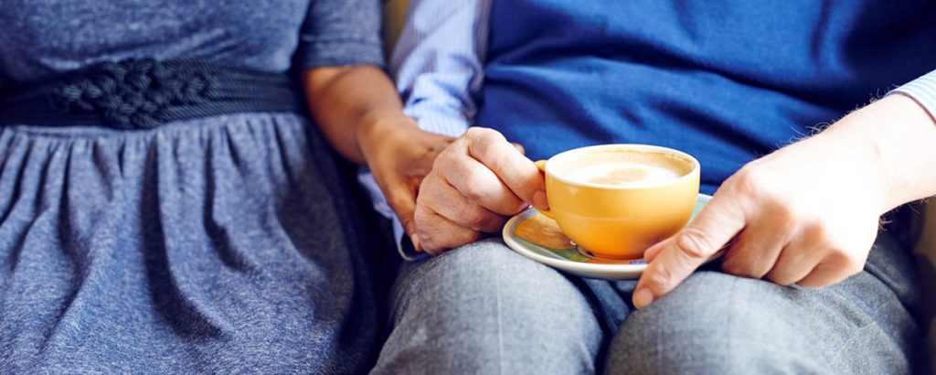 Elderly couple drinking tea