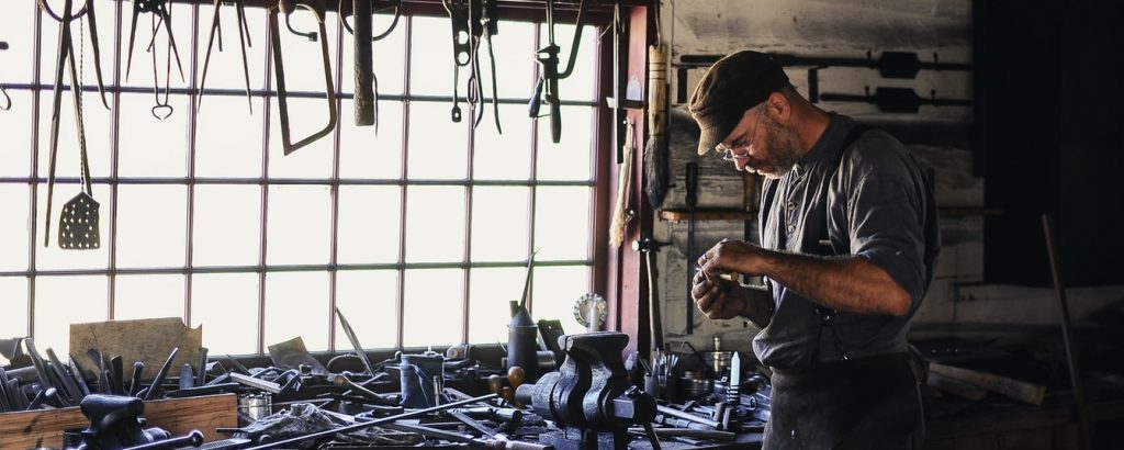 Man in his shed full of tools