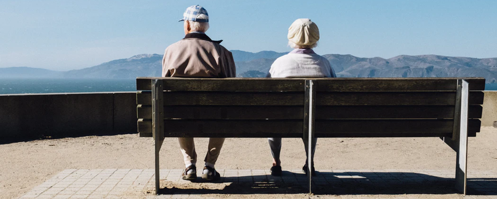 elderly couple on bench